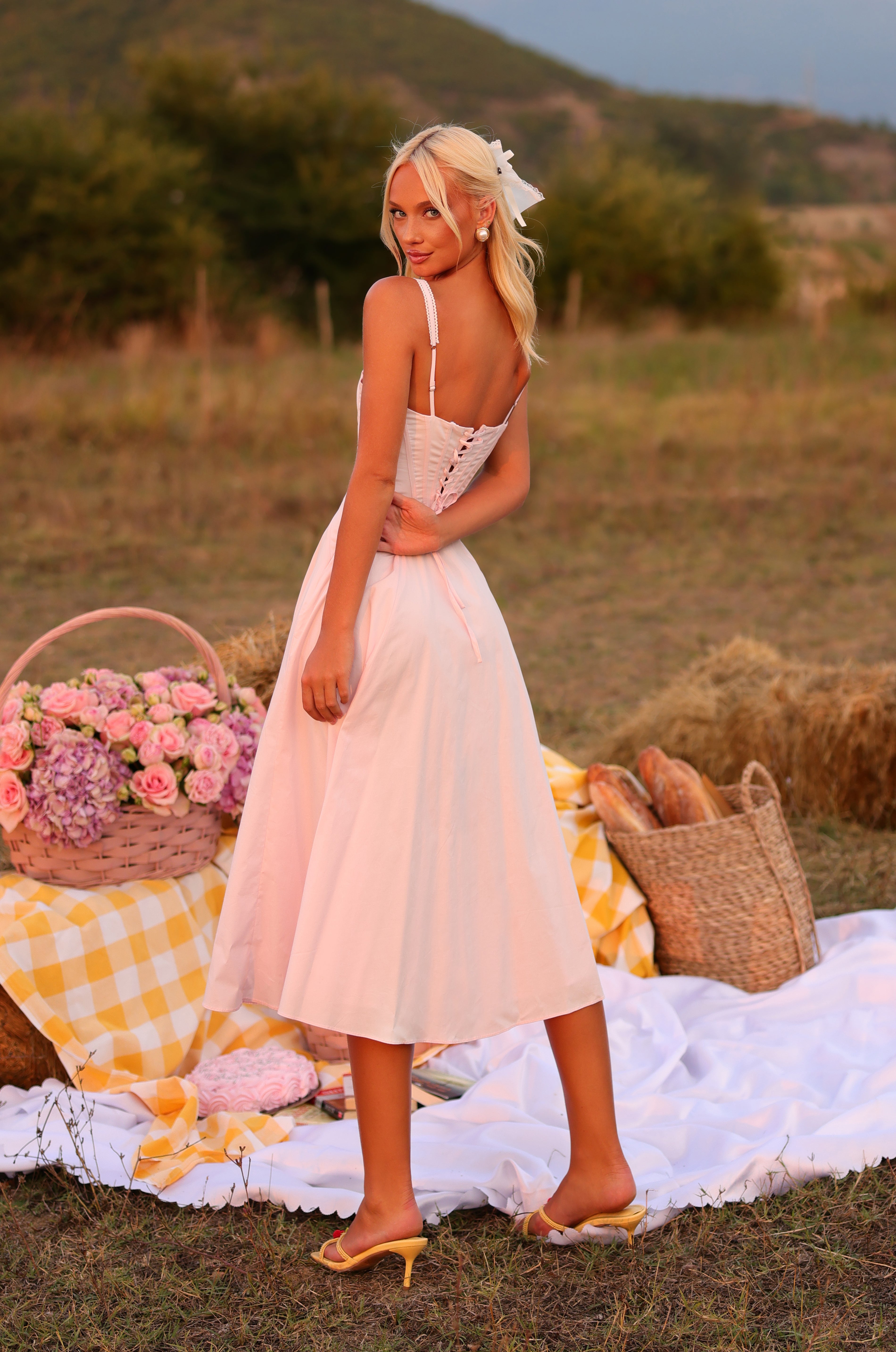 Primrose pink corset midi dress with sweetheart neckline